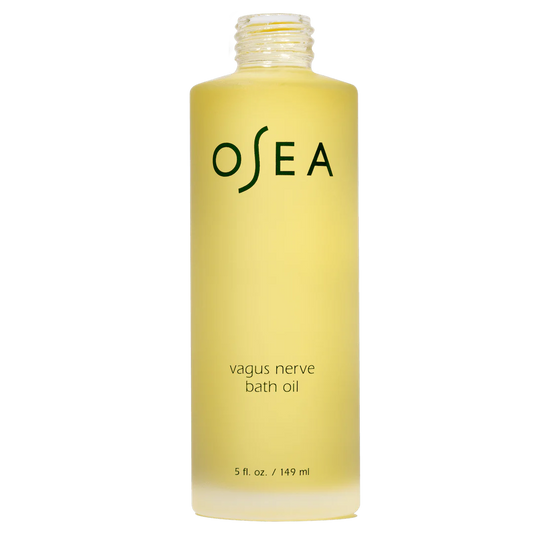 Transparent bottle of osea vagus nerve bath oil against a plain background.
